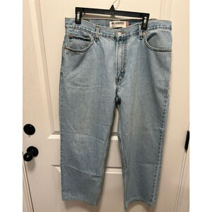 Levi 550 relaxed fit jeans / Light blue stonewash color / Size 36 x 30